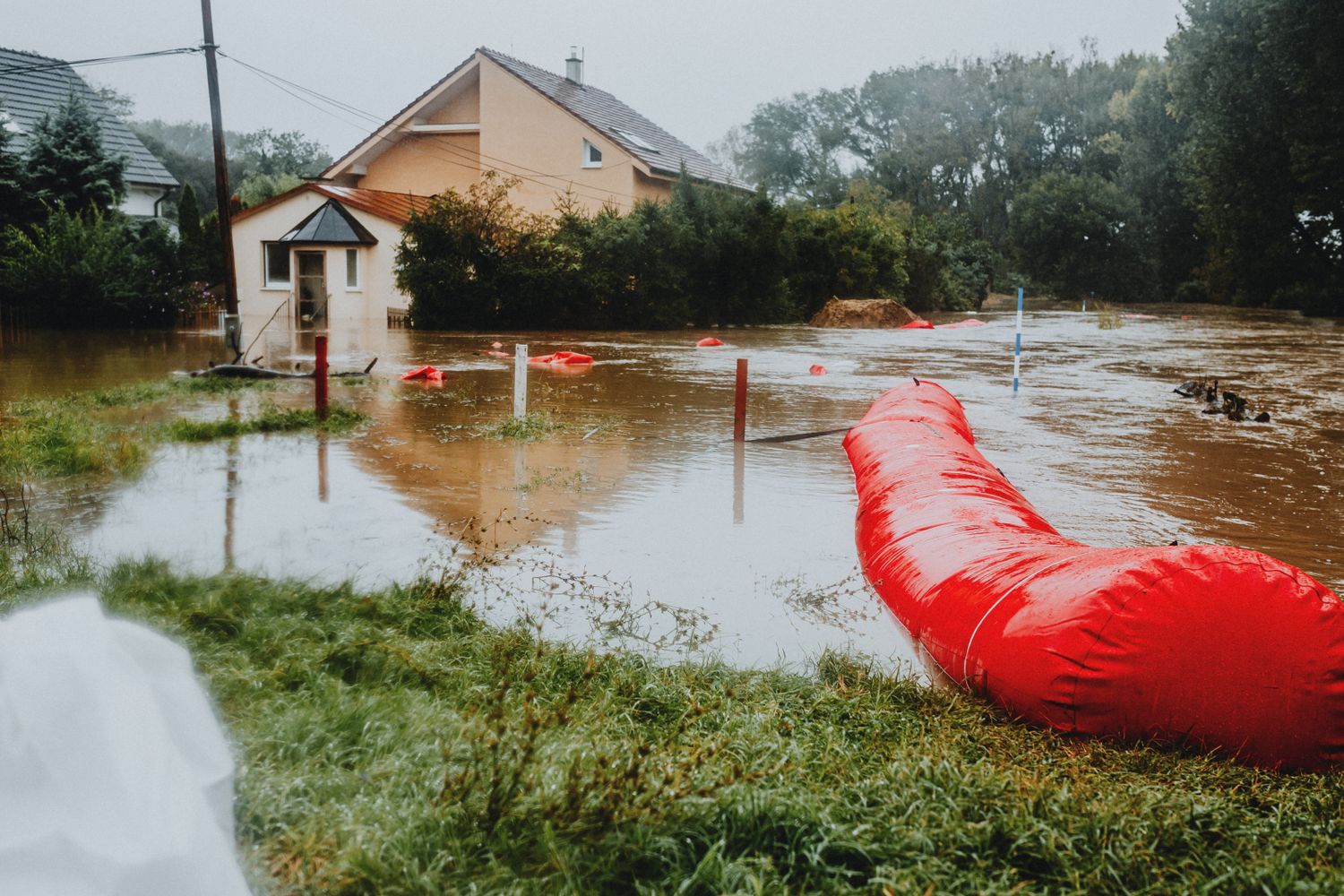 Flooded residential area showing water damage risk