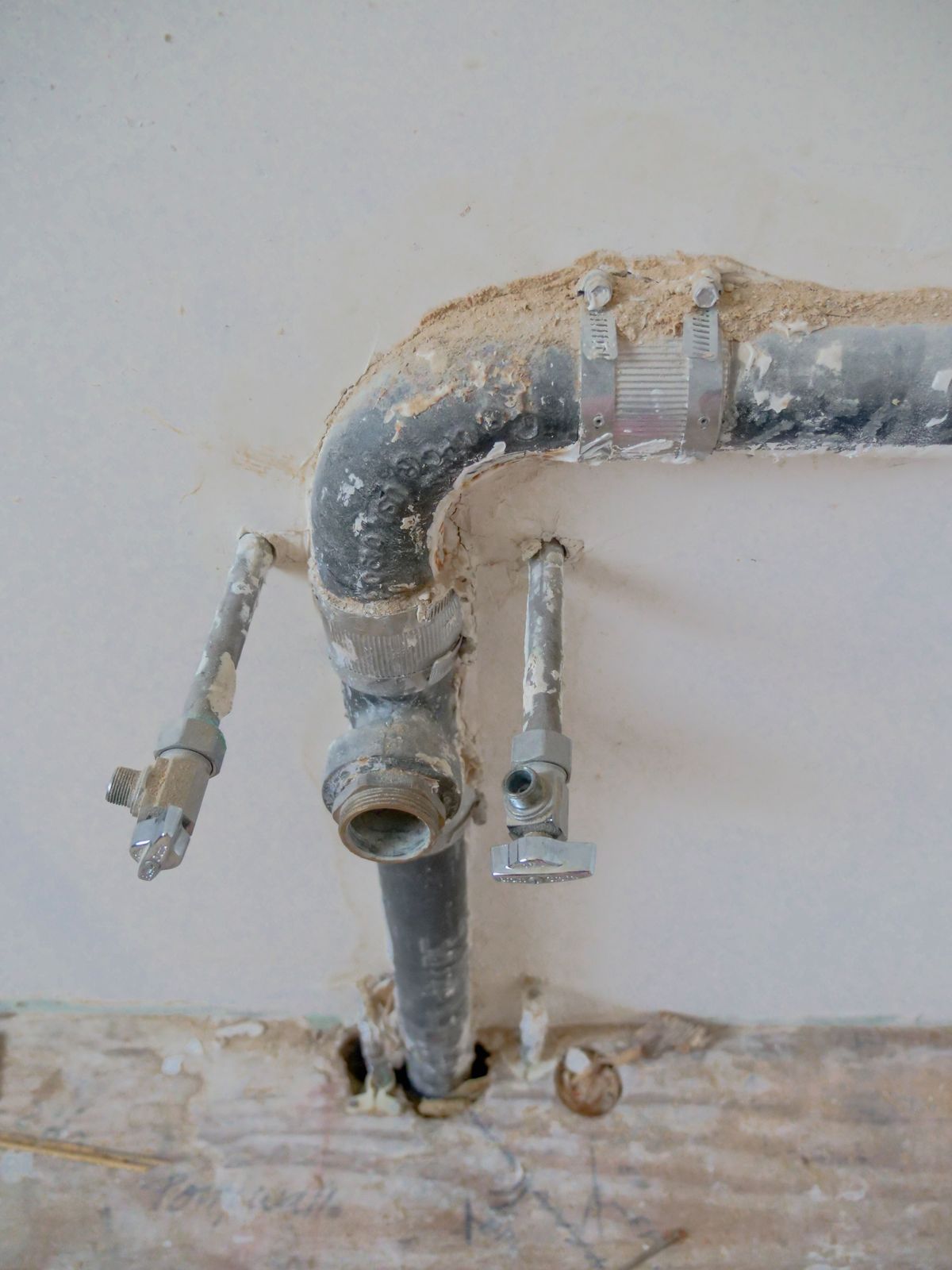 Corroded copper water supply pipes of the type that commonly fail beneath Los Angeles slab foundations
