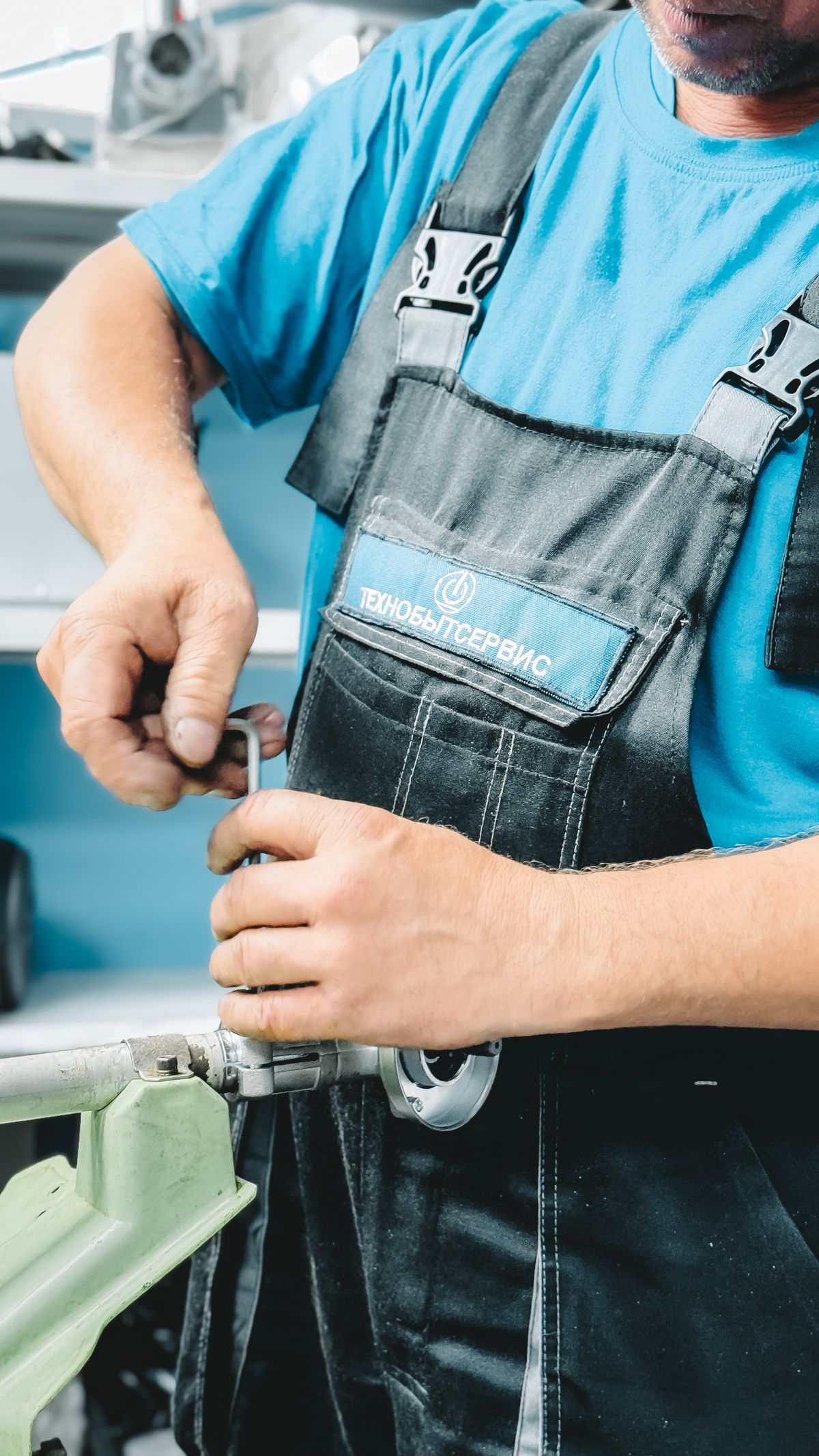 Plumber repairing a failed water line after slab leak water damage was traced to the pipe
